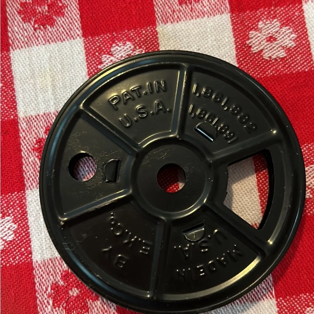 Vintage tin movie reel container with lock